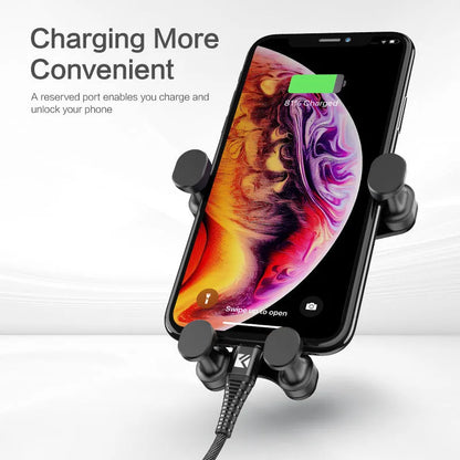 Black car vent phone holder with gravity lock mechanism, shown holding a smartphone at an angle.
