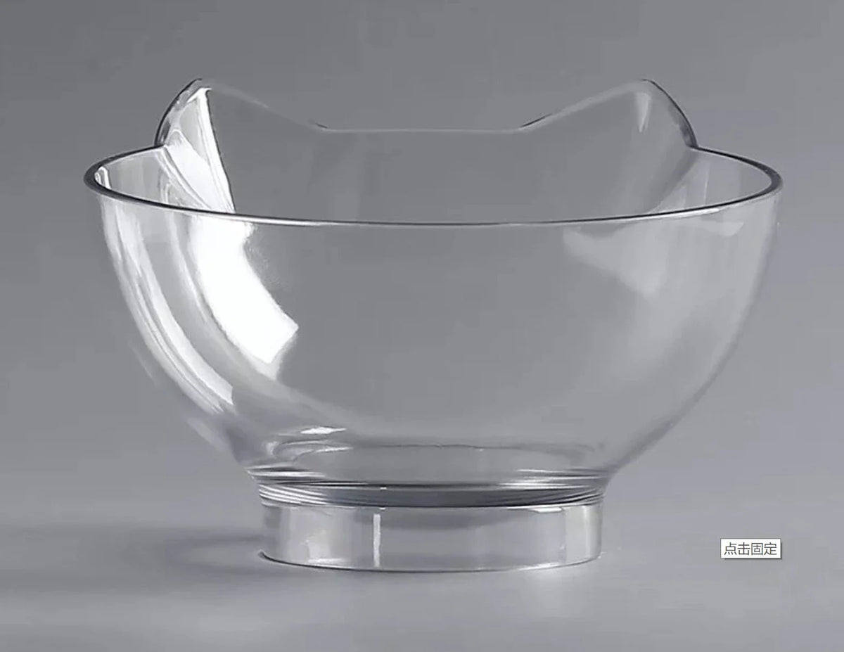 An inclined cat food bowl with a transparent design and a sturdy base, providing a comfortable and hygienic dining experience for your feline friend.