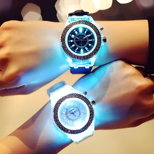 Women's LED luminous quartz watch with silicone strap and round alloy case on wrist