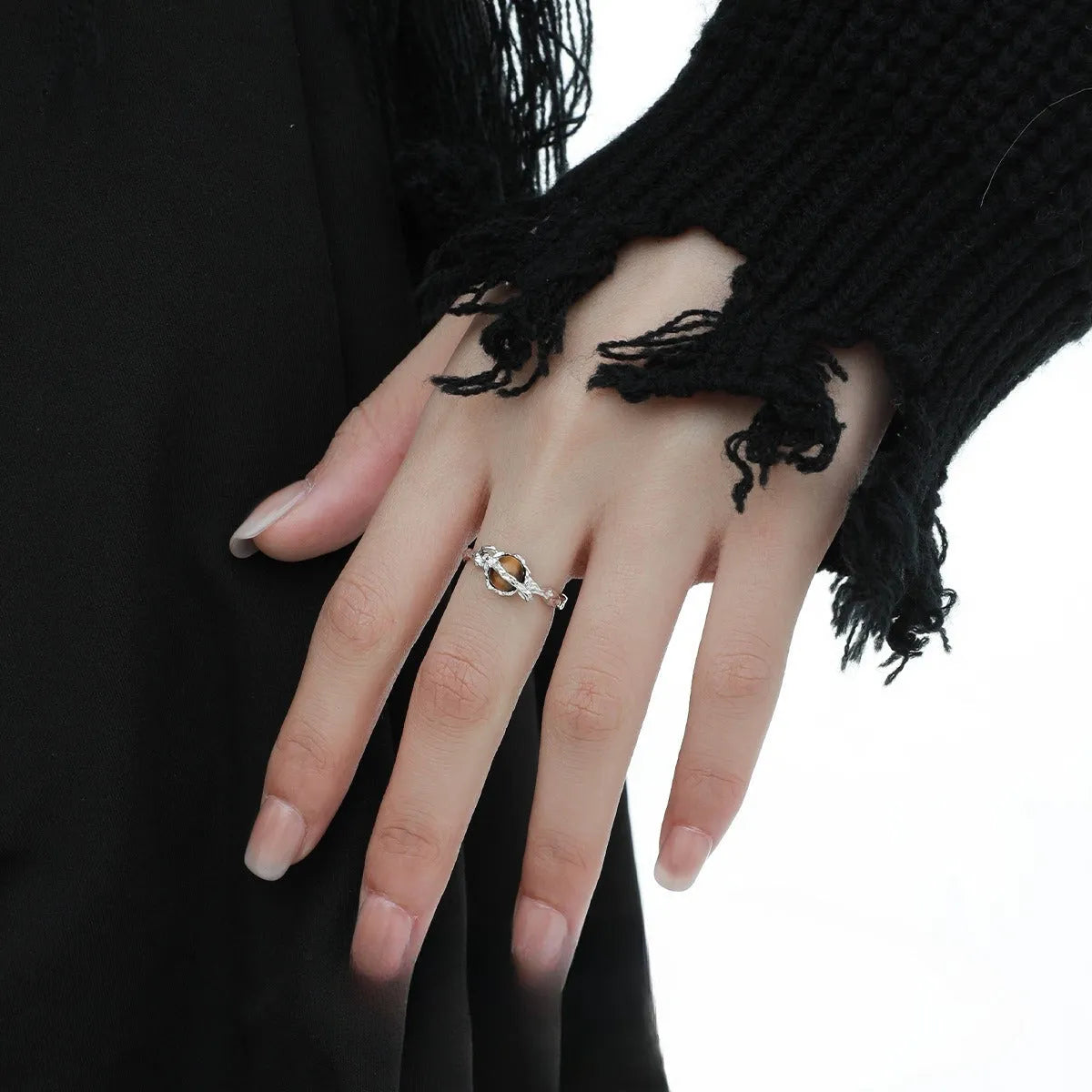 Silver saturn open ring with adjustable opening in white gold colour finish featuring tigereye design elements