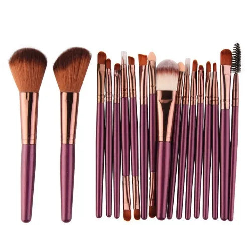 MAANGE 18-piece make-up brush set with fan-shaped tools for contouring and blending on a table