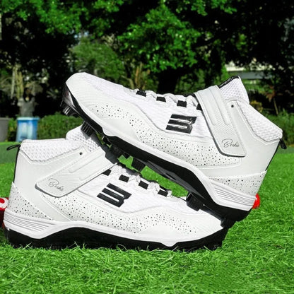 Black and white mid-top sneakers with Velcro closure and rubber soles for softball training