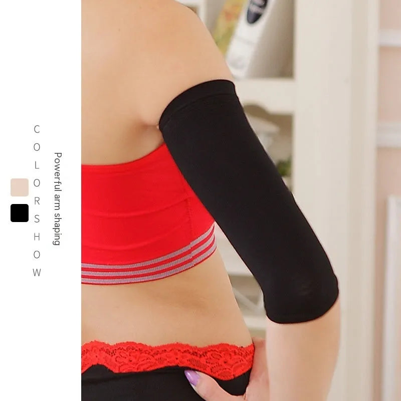 Women's black nylon shaping arm sleeve, free size, laid flat.