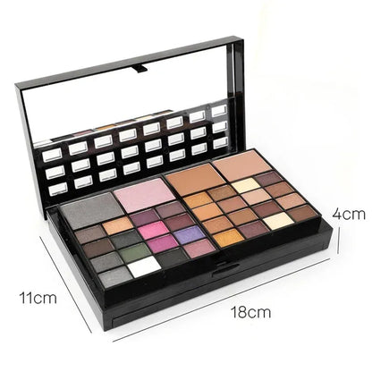 74 colour makeup palette open to show eyeshadows, lip glosses, and face powders with included brushes