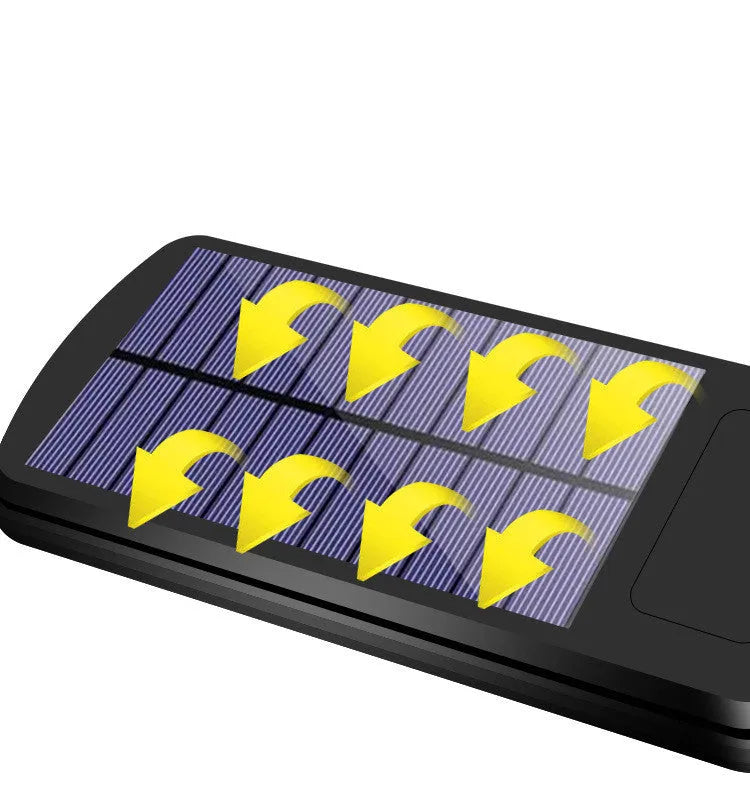 Black solar motion sensor security light for outdoor garden or fence installation with IP65 waterproof rating