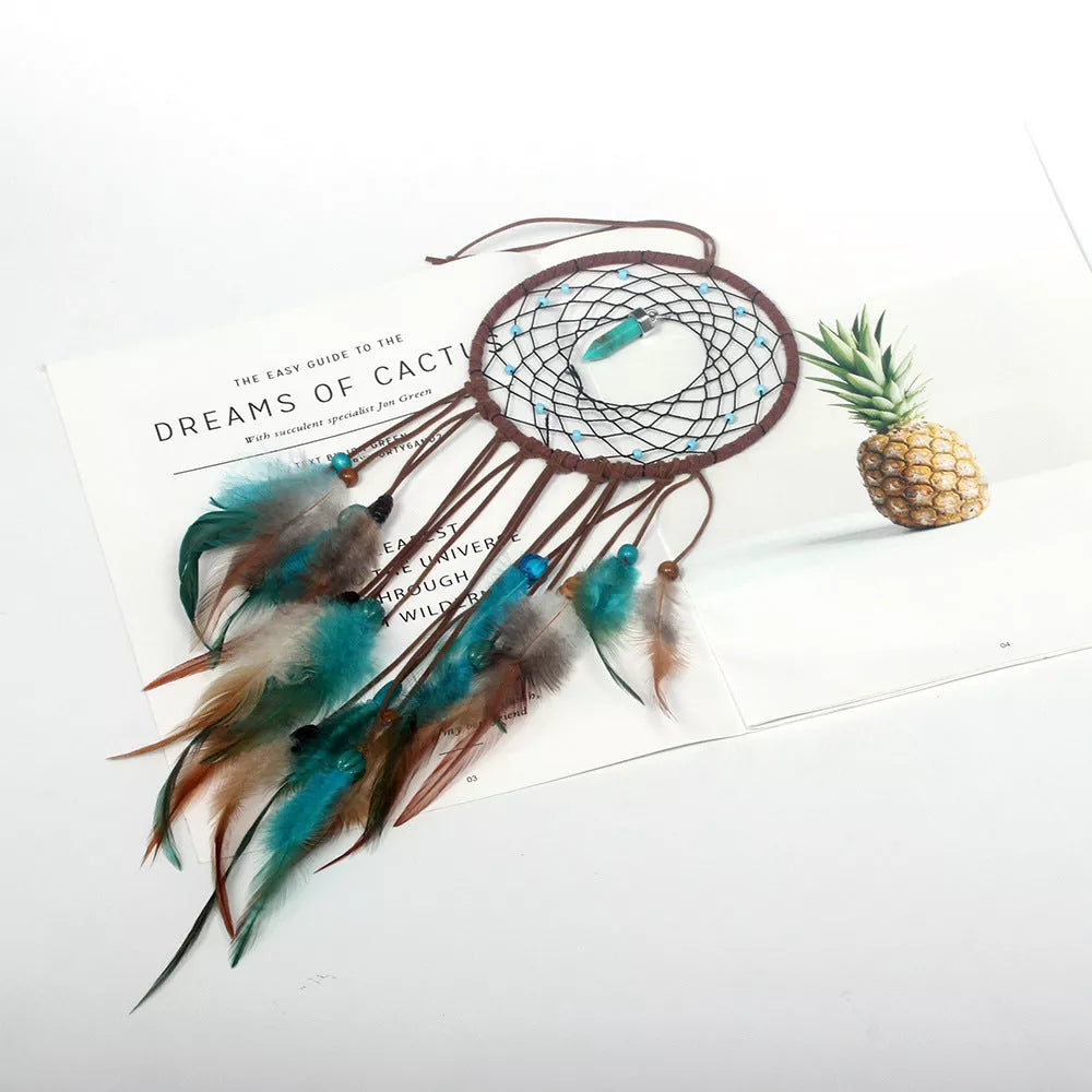 Handmade turquoise dream catcher with feathers and iron ring