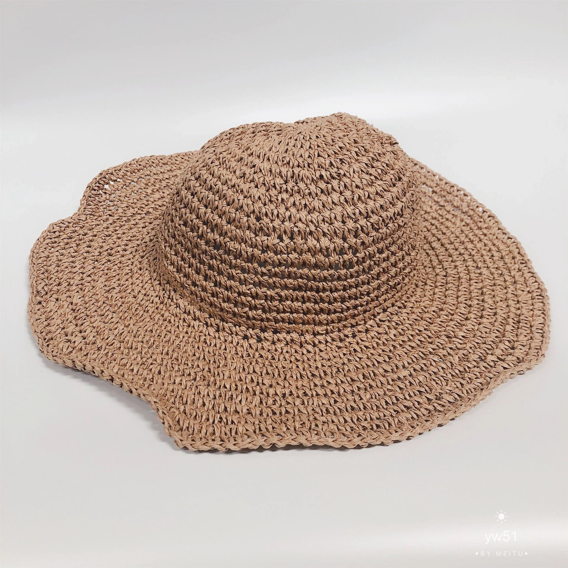 Foldable straw sun hat for women with wide brim for UV protection