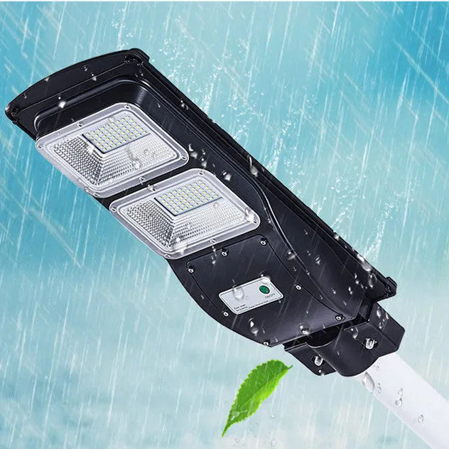 Integrated solar street light with LED illumination and solar panel, remote control operation