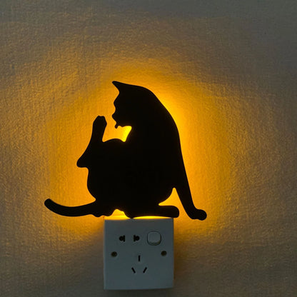Illuminating pet-themed night light with smart sound sensor and customizable design