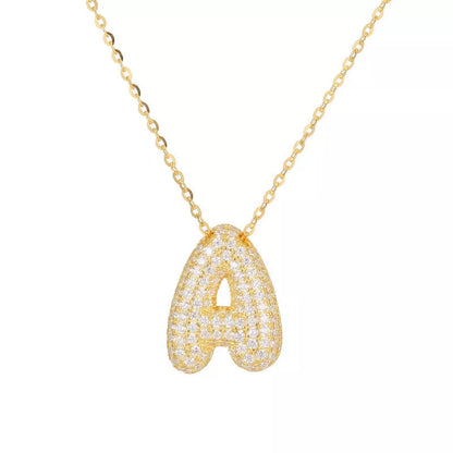 Stainless steel initial pendant necklace with zircon accents, personalized with your choice of letter.