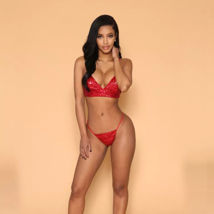 Red sequins bikini suit with suspenders and nail sequins for a bold beach look