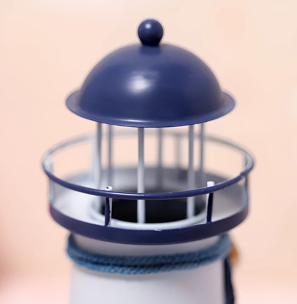 Solar-powered tin lighthouse garden statue with flashing LED light in three sizes