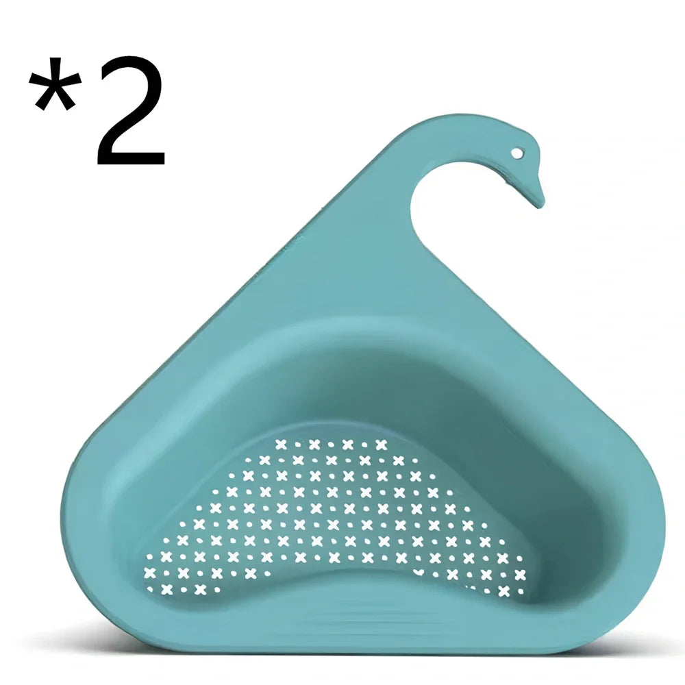Yellow swan-shaped plastic kitchen drainer basket with drainage holes on kitchen counter