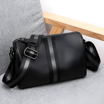 Black genuine leather one-shoulder crossbody bag with dimensions 24cm wide by 16cm high.