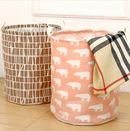 Foldable cotton-linen laundry basket with cartoon polar bear design, collapsed to show 8cm height