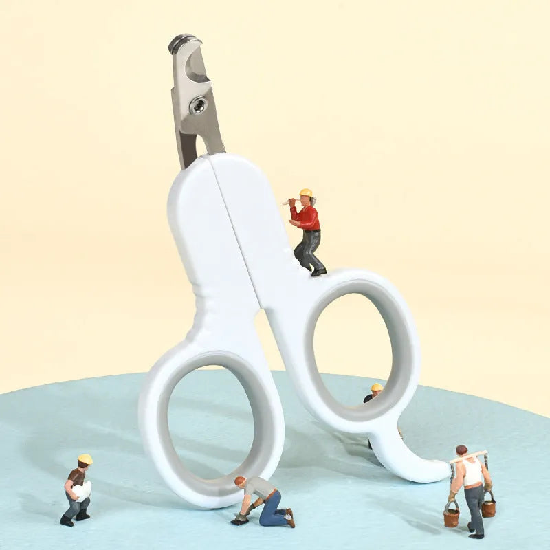 Professional grey pet nail clippers with curved safety tips and a rubberised ergonomic handle on a white background.