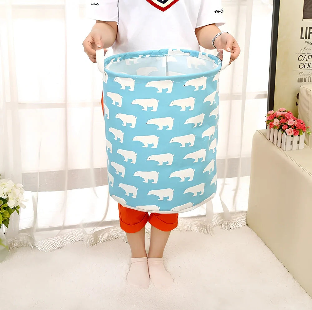 Foldable cotton-linen laundry basket with cartoon polar bear design, collapsed to show 8cm height