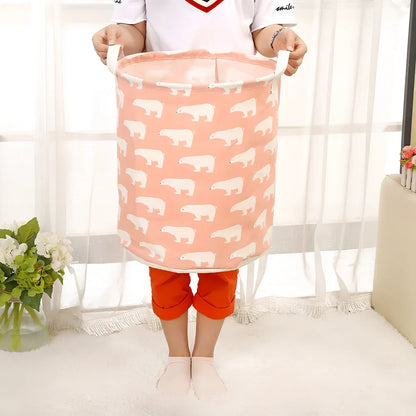 Foldable cotton-linen laundry basket with cartoon polar bear design, collapsed to show 8cm height
