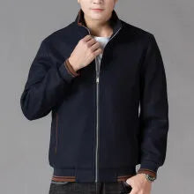 Men's grey sports-style fleece coat with long sleeves and a chest pocket on a hanger.