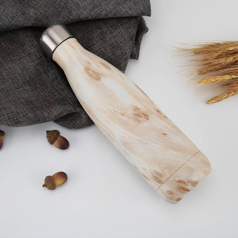 Stainless steel thermal water bottle with 500ml capacity and vacuum insulation technology