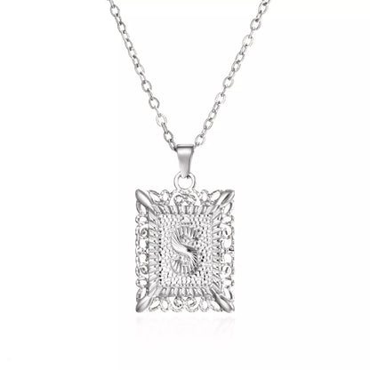 Personalized initial letter necklace in gold or steel, featuring any letter from A to Z