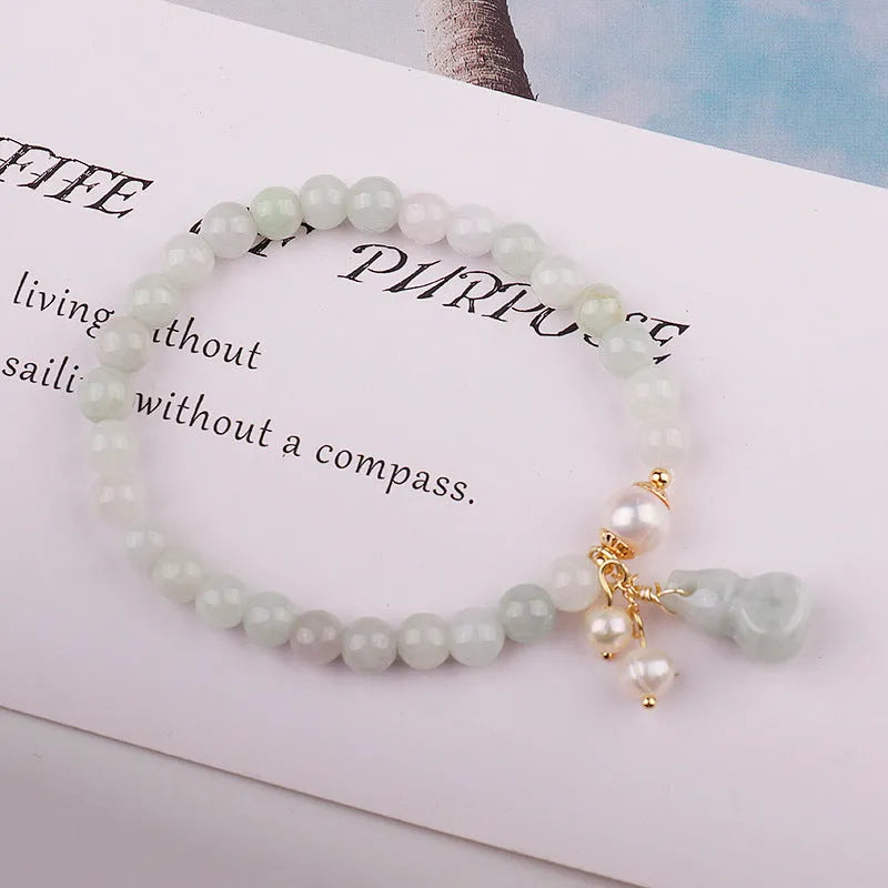Natural emerald jade bracelet with traditional Chinese gourd design elements for women