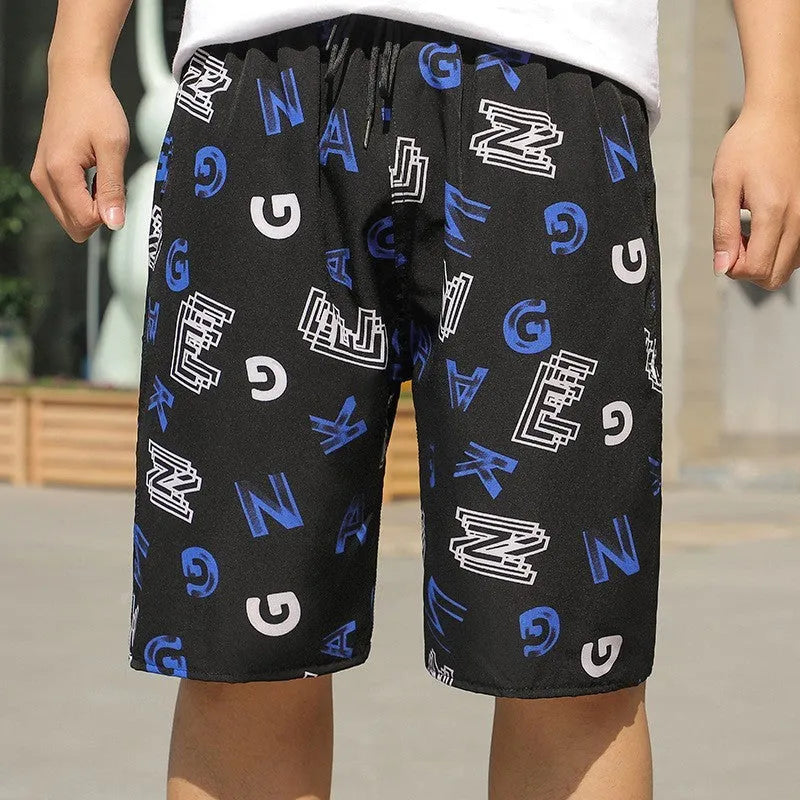 Man wearing loose-fitting striped beach pants made from quick-dry ice silk fabric.