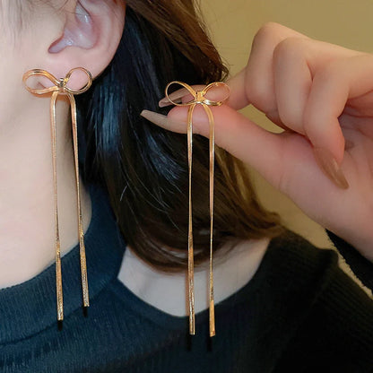 Elegant hypoallergenic 18k gold plated bow earrings for sensitive ears