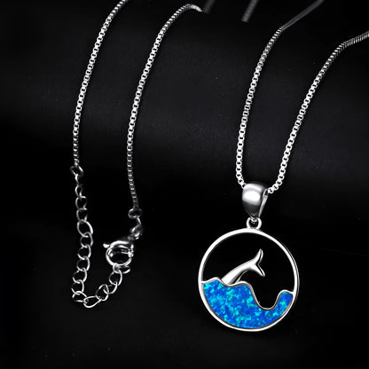 White gold electroplated copper necklace with round blue opal in geometric sea fishtail design on 45cm chain