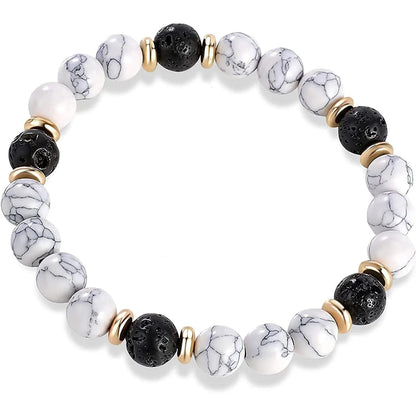 Handcrafted natural stone bracelet with alloy volcano white turquoise charm in a simple design.