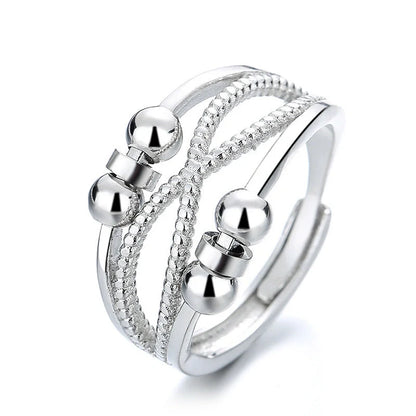 Adjustable rotatable anxiety relief ring for women with open design and platinum finish