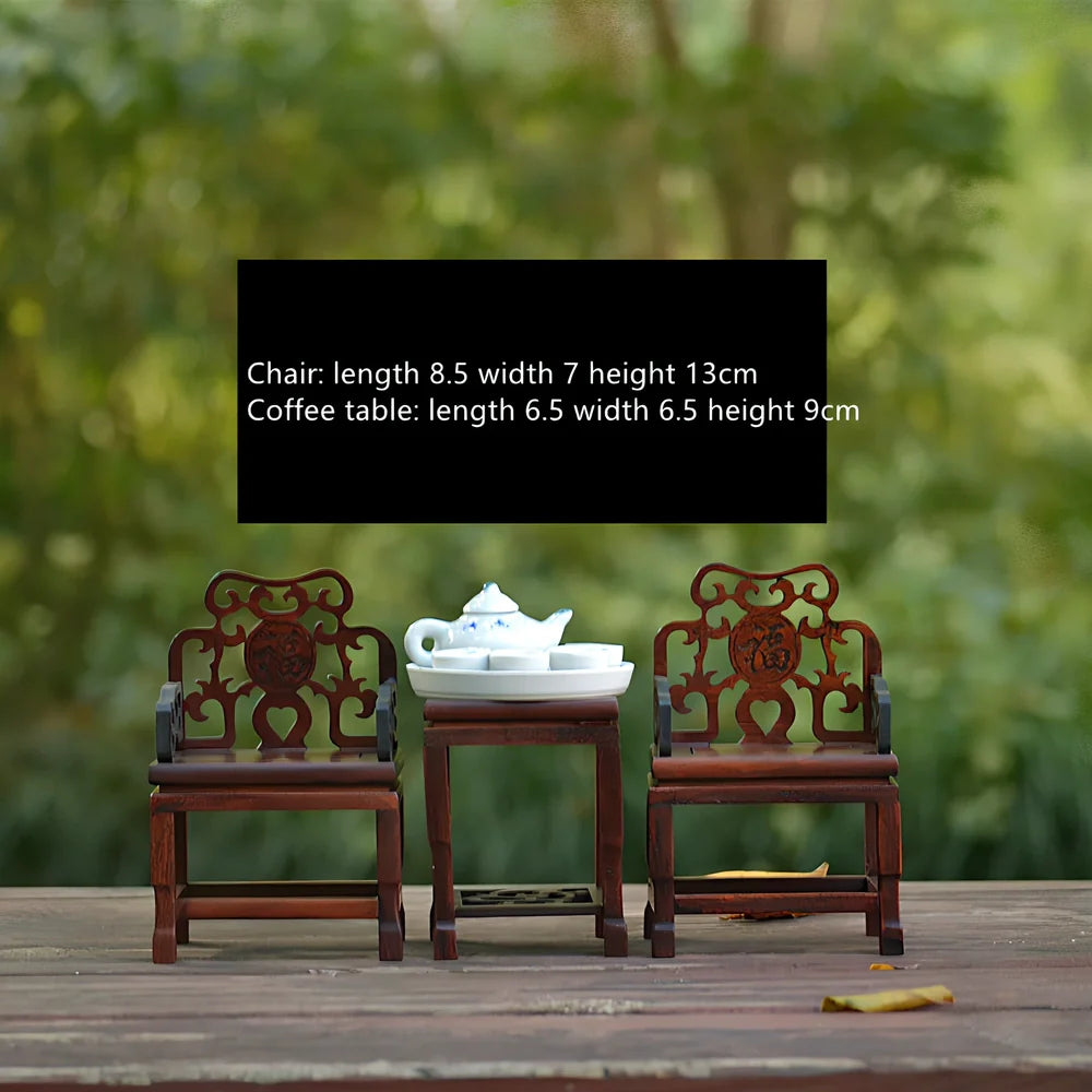 Red rosewood miniature Chinese furniture model with traditional carved details and mahogany construction