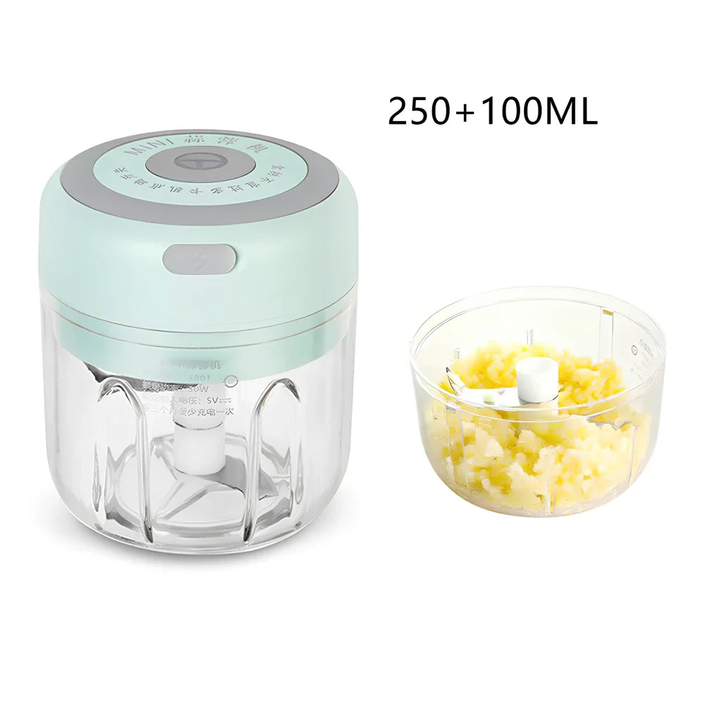 Mini electric garlic chopper with stainless steel blades in green, pink, or white with USB charging cable