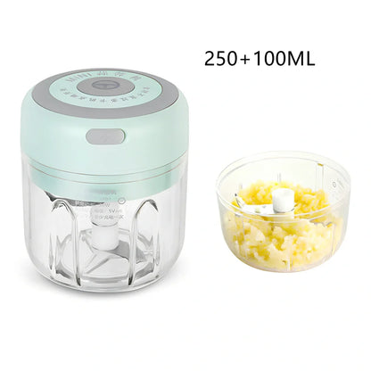 Mini electric garlic chopper with stainless steel blades in green, pink, or white with USB charging cable