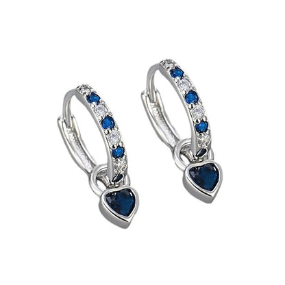 Fashion zircon earrings with 10mm heart-shaped drops in gold and white gold settings, showing diamond-treated stones