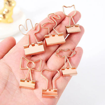 Golden decorative metal clip with 5.5cm length and 2.5cm tail in bow, cactus, cat, flamingo, or love design