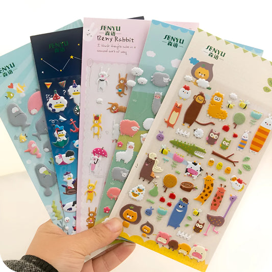 Cartoon three-dimensional bubble stickers showing colourful animal, food and pattern designs for decoration