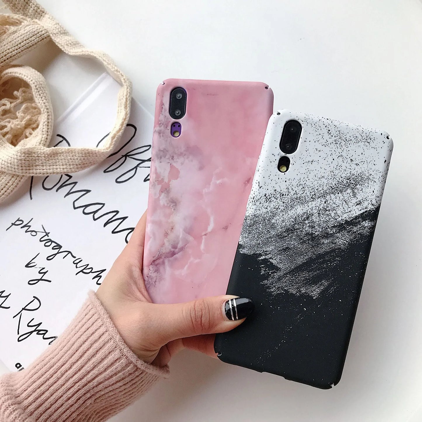 Black and pink painted hard PC phone cases for Honor and Huawei smartphones.