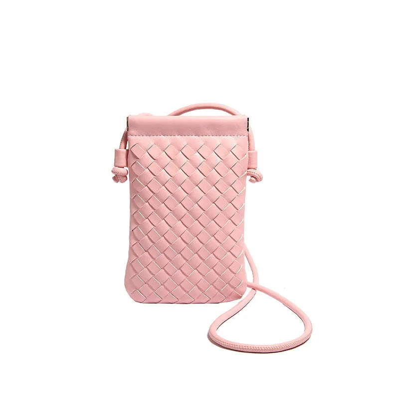 Vertical square vintage weave crossbody bag in multiple colours showing internal dark cell phone pocket.