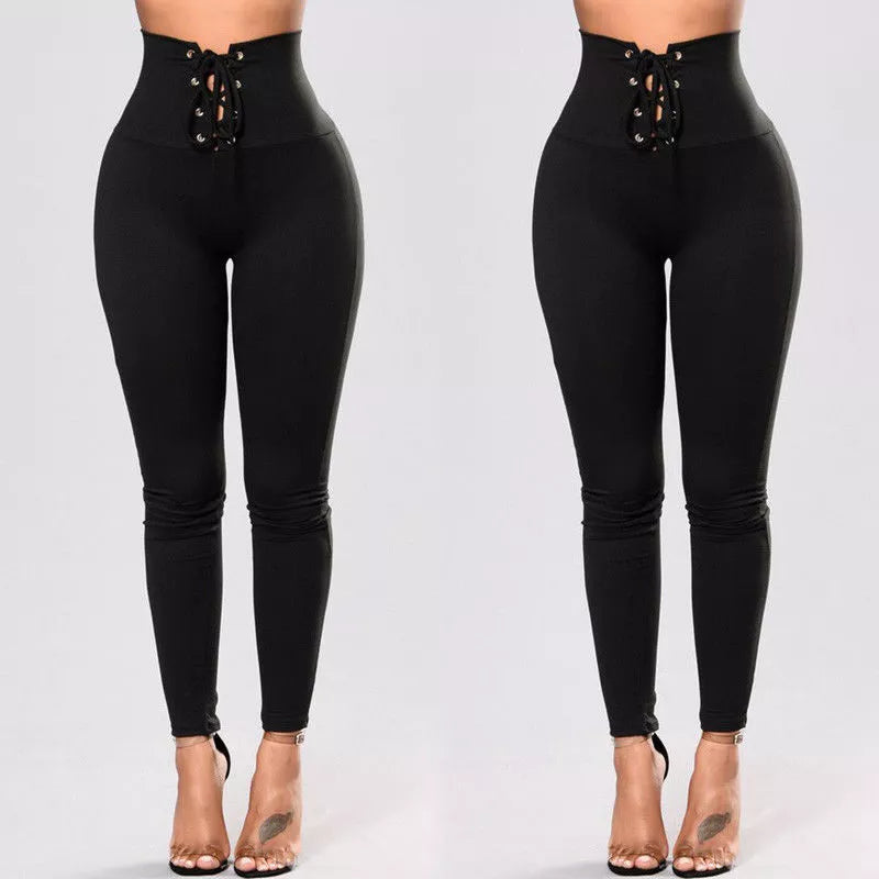 Women's Rivet Yoga Pants with waist tie for a secure fit and stylish detailing