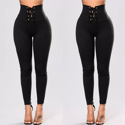 Women's Rivet Yoga Pants with waist tie for a secure fit and stylish detailing