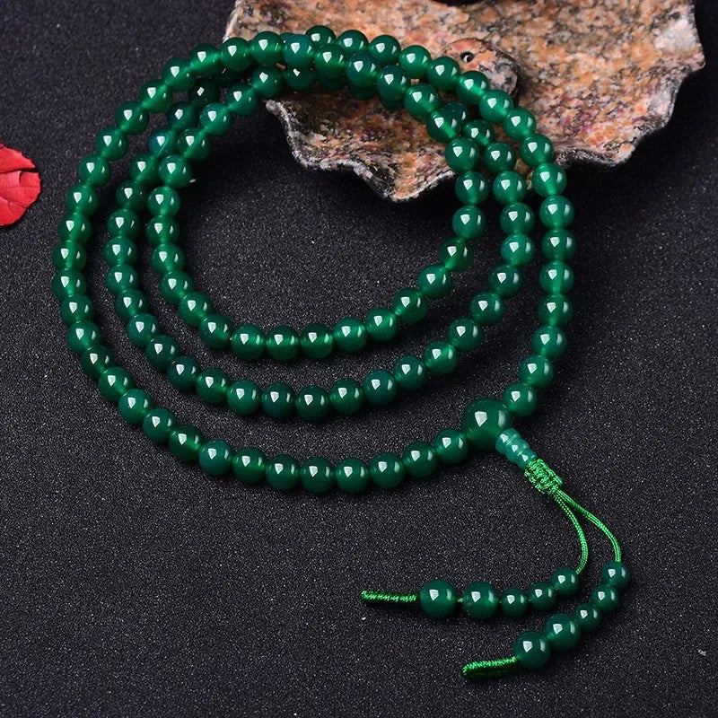 Handmade natural green agate bracelet with thangka pendant and multi-circle bead design