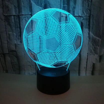 3D football-shaped LED night light showing colourful gradient illumination on a dark background