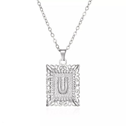 Personalized initial letter necklace in gold or steel, featuring any letter from A to Z