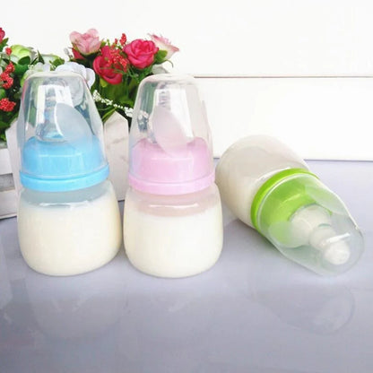 60ml infant feeding bottle with variable flow nipple in blue, green, or pink colour options