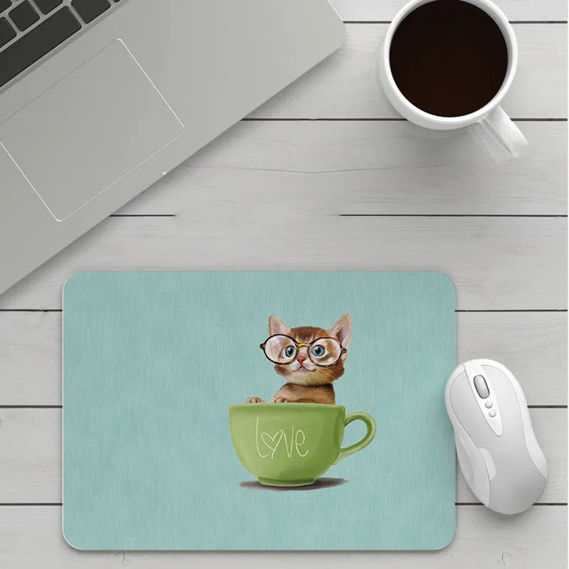 Customisable thick cartoon mouse pad with non-slip base, showing sample patterns like strawberry, cat, and whale designs.
