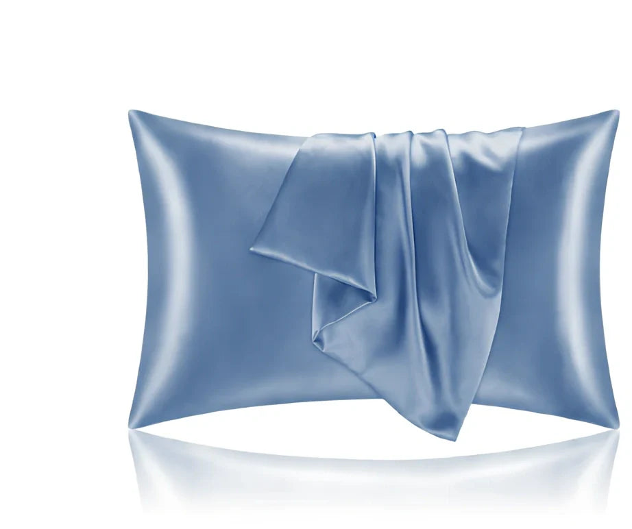 Silk-effect satin envelope pillowcase in navy blue showing envelope closure and smooth fabric texture