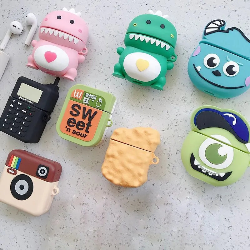 Green silicone AirPods case with a cartoon animal print, showing charging port cutout.