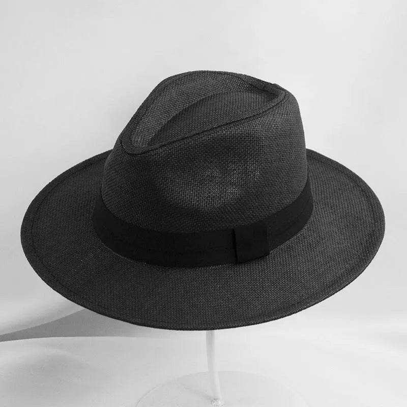 Men's wide brim flat top sun hat in beige colour with a paper fabric construction.