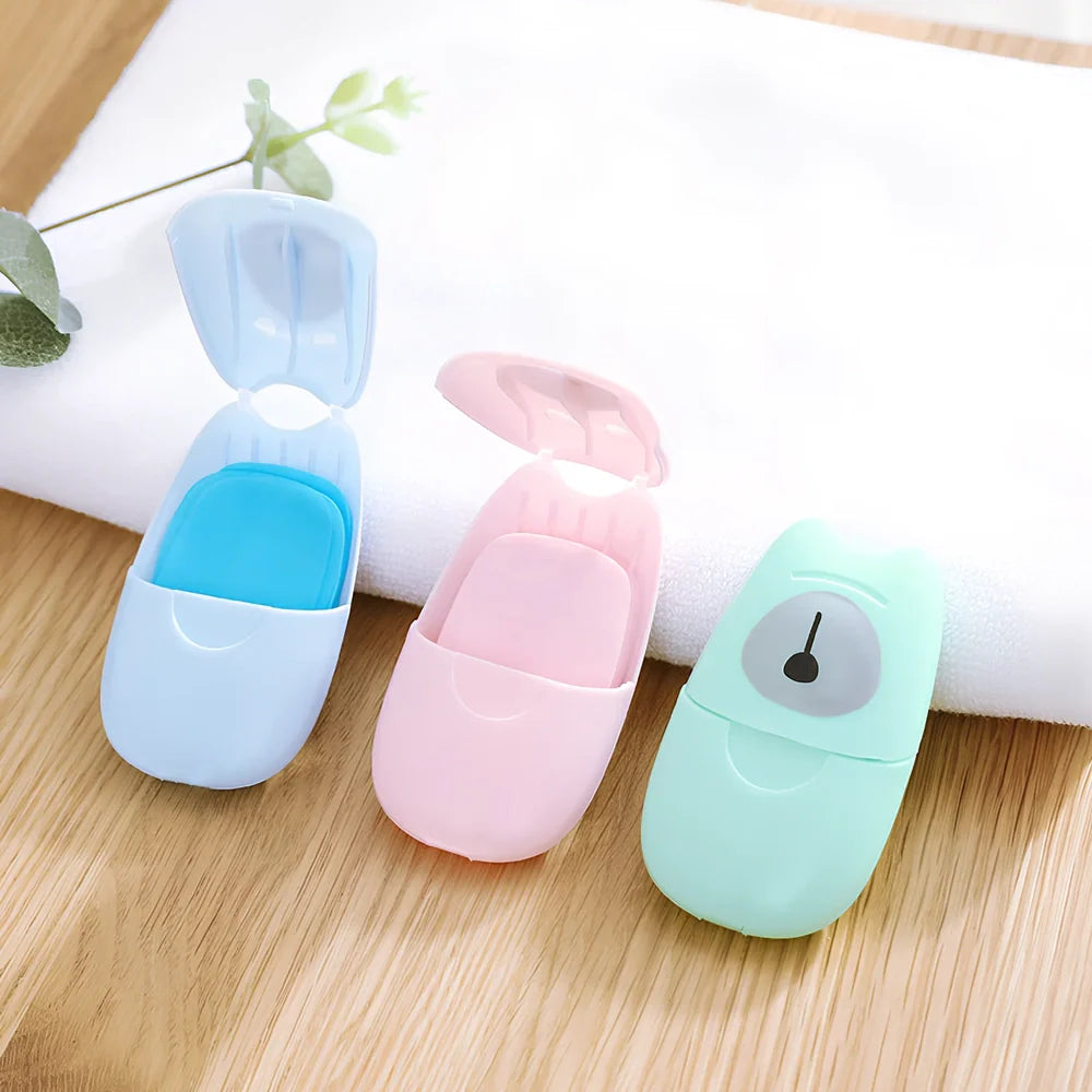 Pack of 50 pink biodegradable soap paper sheets, each 8x4.5cm, for portable hand cleaning on travels